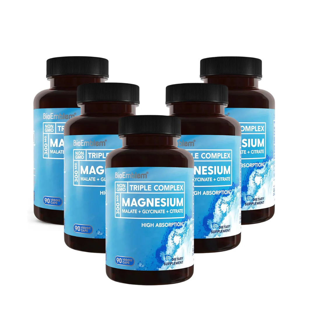 Six bottles of magnesium supplement with blue labels on a white background