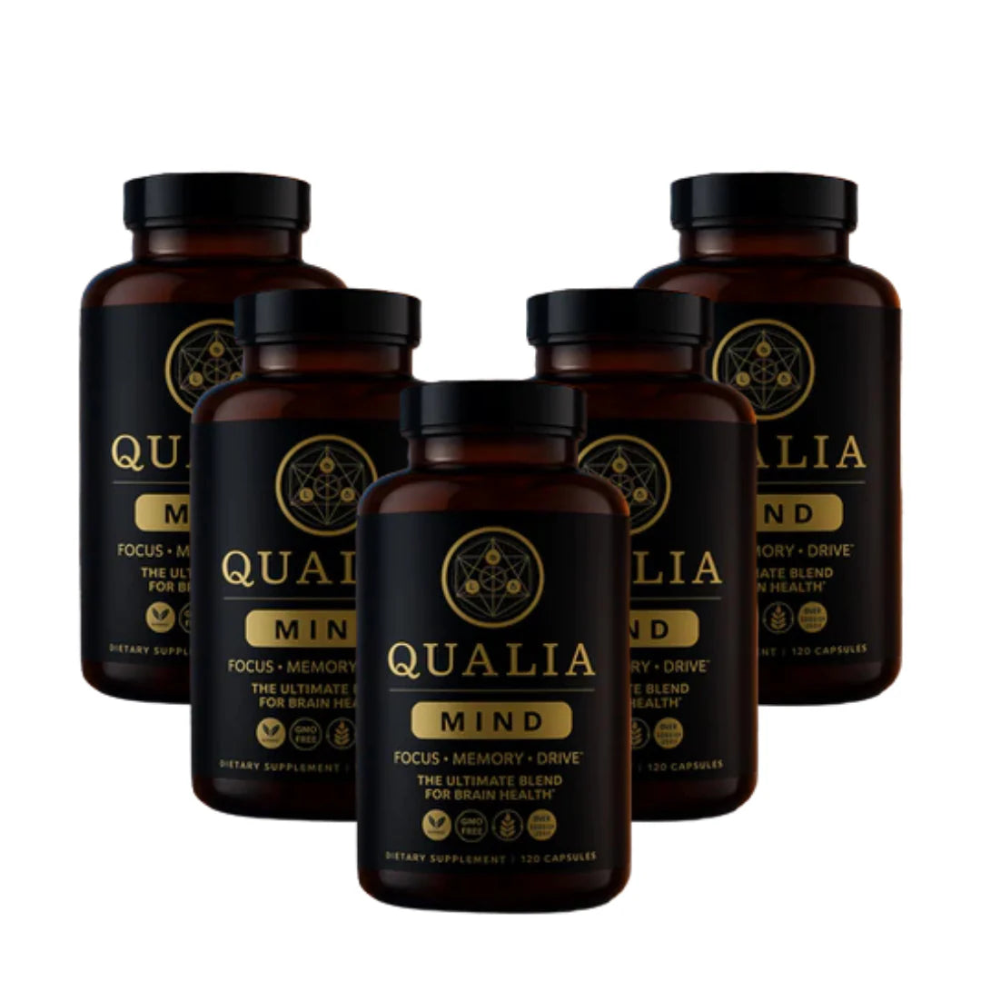 Multiple bottles of Qualia Mind supplements on a white background