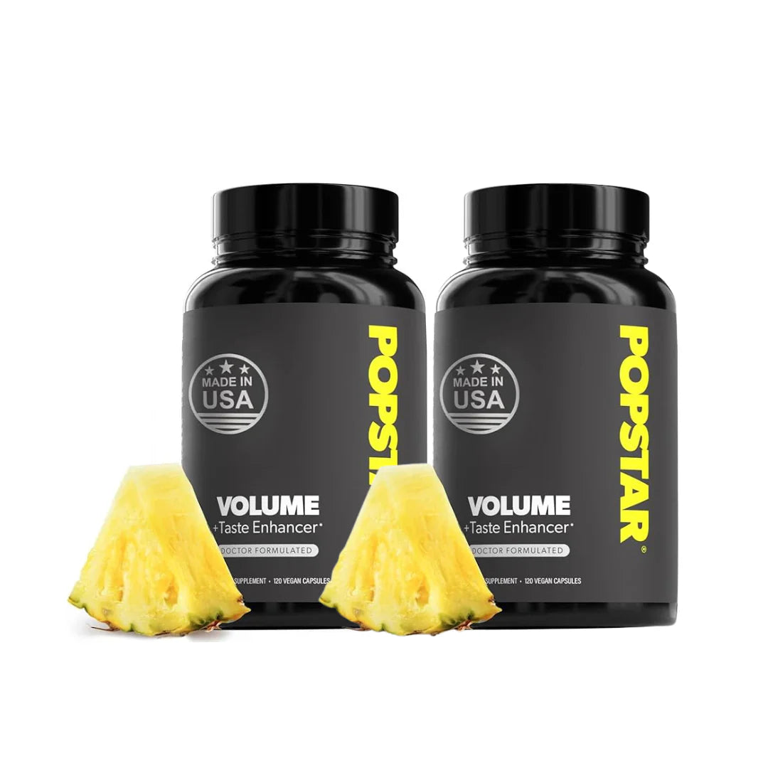 Two bottles of POPSTAR Volume Taste Enhancer with two pineapples on a white background
